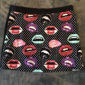 Mouth and polka dot print skirt